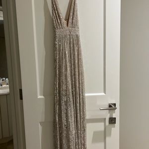 Shimmery champagne full length dress. Perfect for a wedding guest or bridesmaid.